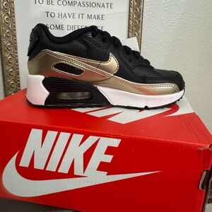 Nike Kids Black and Gold Sneakers